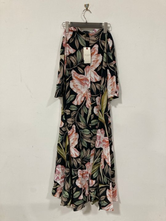 Lot 1179  
            Marchington SR10 - Parcel Delivery Only 

                
TED BAKER PRINTED SHORT SLEEVE MIDI DRESS - SIZE US 1 ORIGINAL RRP £259: LOCATION...
