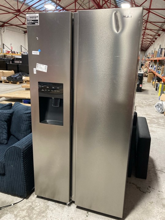 Lot 248  
            Marchington SR17 - Delivery or Collection 

                
HAIER AMERICAN-STYLE FRIDGE FREEZER IN PLATINUM INOX - MODEL NO. HSR5918DIMP ORIG...