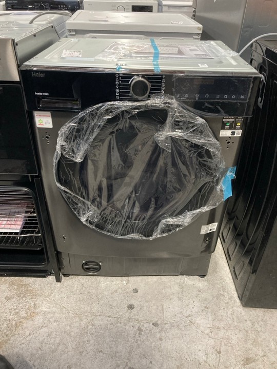 Lot 50  
            Marchington SR17 - Delivery or Collection 

                
HAIER SERIES 6 WASHER DRYER MODEL : BHA6S696M6DB9R80 - ORIGINAL RRP - £649: LOCAT...