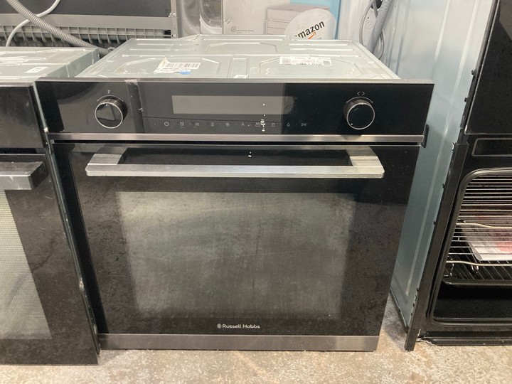 Lot 52  
            Marchington SR17 - Delivery or Collection 

                
RUSSELL HOBBS BUILT IN ELECTRIC FAN OVEN & MICROWAVE MODEL : RHMEO7202DS - ORIGIN...
