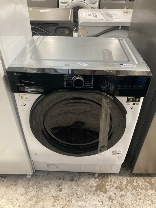 Lot 73  
            Marchington SR17 - Delivery or Collection 

                
HAIER BUILT IN WASHER DRYER MODEL : BHA6SD696M6DB980 - ORIGINAL RRP - £629: LOCAT...