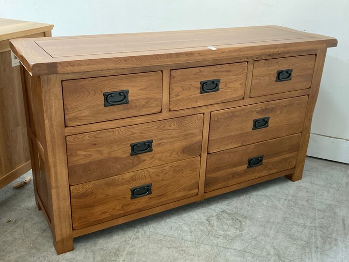 Lot 102  
            Marchington SR10 - Delivery or Collection 

                
OAK FURNITURELAND ORIGINAL RUSTIC SOLID OAK 3+4 CHEST OF DRAWERS - ORIGINAL RRP £...