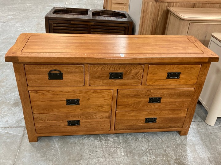 Lot 125  
            Marchington SR10 - Delivery or Collection 

                
OAK FURNITURELAND ORIGINAL RUSTIC SOLID OAK 3+4 CHEST OF DRAWERS - ORIGINAL RRP £...