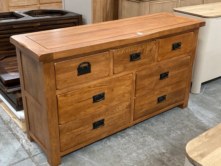 Lot 125  
            Marchington SR10 - Delivery or Collection 

                
OAK FURNITURELAND ORIGINAL RUSTIC SOLID OAK 3+4 CHEST OF DRAWERS - ORIGINAL RRP £...