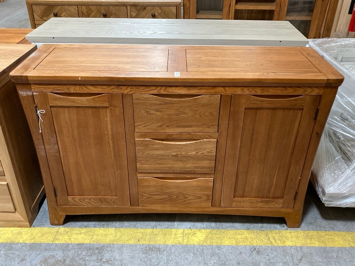 Lot 130  
            Marchington SR10 - Delivery or Collection 

                
OAK FURNITURELAND ORRICK RUSTIC SOLID OAK LARGE SIDEBOARD - ORIGINAL RRP £549.99:...