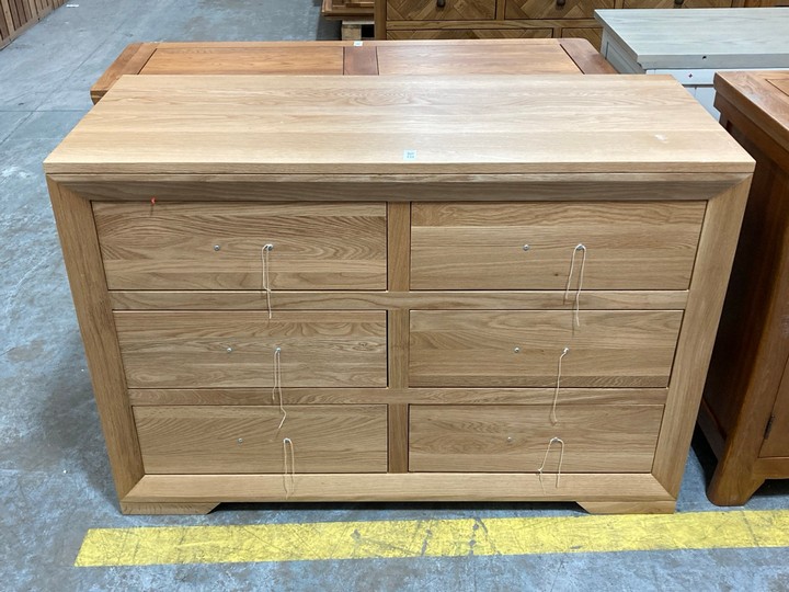 Lot 131  
            Marchington SR10 - Delivery or Collection 

                
OAK FURNITURELAND BEVEL NATURAL SOLID OAK 6 DRAWER CHEST - ORIGINAL RRP £579.99: ...