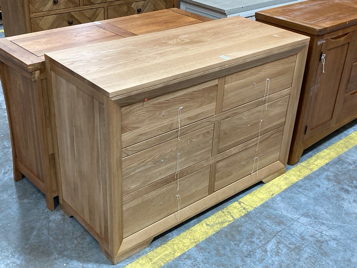 Lot 131  
            Marchington SR10 - Delivery or Collection 

                
OAK FURNITURELAND BEVEL NATURAL SOLID OAK 6 DRAWER CHEST - ORIGINAL RRP £579.99: ...
