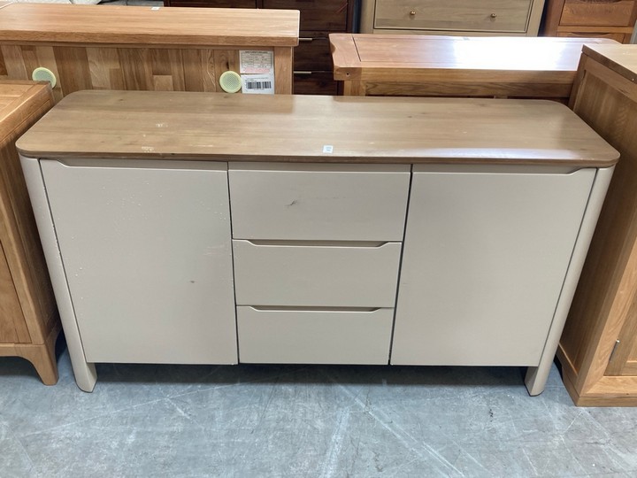 Lot 16  
            Marchington SR10 - Delivery or Collection 

                
OAK FURNITURELAND OTTO SMOKED OAK FINISH AND CASHMERE PAINTED LARGE SIDEBOARD - O...