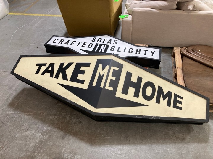Lot 182  
            Marchington SR10 - Delivery or Collection 

                
2 X ASSORTED LARGE VINTAGE STYLE SHOP SIGNAGE ITEMS TO INCLUDE 'TAKE ME HOME' LAR...