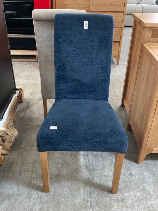 Lot 18  
            Marchington SR10 - Delivery or Collection 

                
OAK FURNITURELAND SCROLL BACK CHAIR IN BROOKLYN HUMMINGBIRD BLUE CRUSHED CHENILLE...