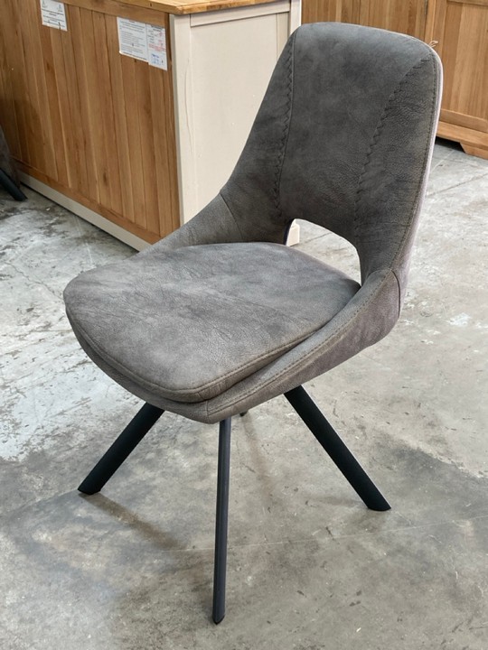 Lot 34  
            Marchington SR10 - Delivery or Collection 

                
OAK FURNITURELAND NICO SWIVEL DINING CHAIR IN DARK GREY SUEDE LOOK FABRIC - ORIGI...