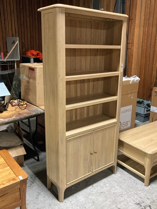 Lot 358  
            Marchington SR10 - Delivery or Collection 

                
OAK FURNITURELAND NEWTON LIGHT NATURAL SOLID OAK TALL BOOKCASE - ORIGINAL RRP £67... - Image 2