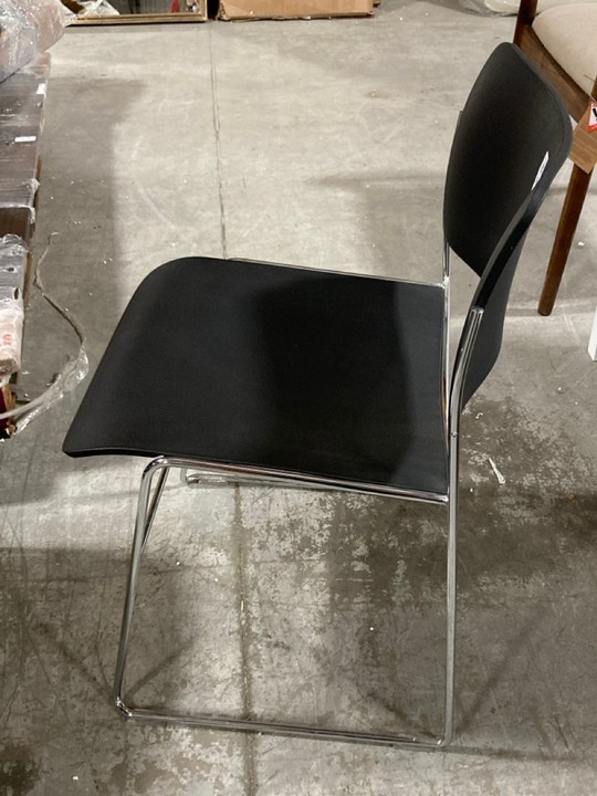 Lot 364  
            Marchington SR10 - Delivery or Collection 

                
HOWE STACKING CHAIR IN BLACK WITH POLISHED CHROME FRAME - ORIGINAL RRP £228: LOCA... - Image 4
