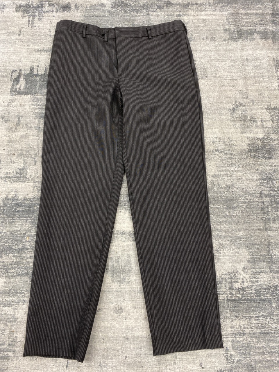 Lot 104  
            Edinburgh SR20 - Delivery Only 

                
SAINT LAURENT STRIPED DRESS PANTS IN BLACK WOOL NO SIZE: LOCATION - RAIL 3