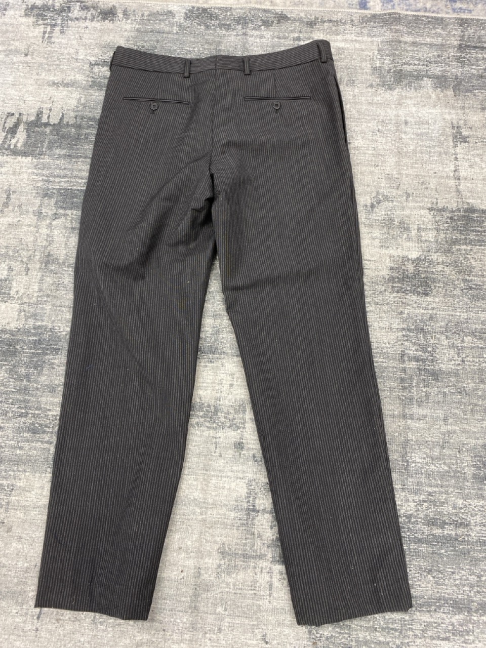 Lot 104  
            Edinburgh SR20 - Delivery Only 

                
SAINT LAURENT STRIPED DRESS PANTS IN BLACK WOOL NO SIZE: LOCATION - RAIL 3