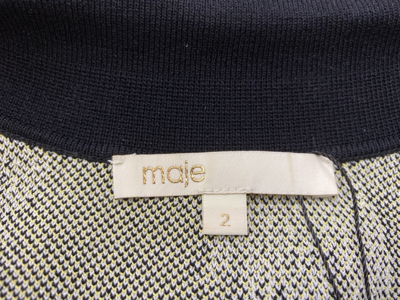 Lot 115  
            Edinburgh SR20 - Delivery Only 

                
MAJE MISSECA FLORAL COLLARED SHORT-SLEEVE TOP IN BLACK COTTON SIZE 2: LOCATION - ...