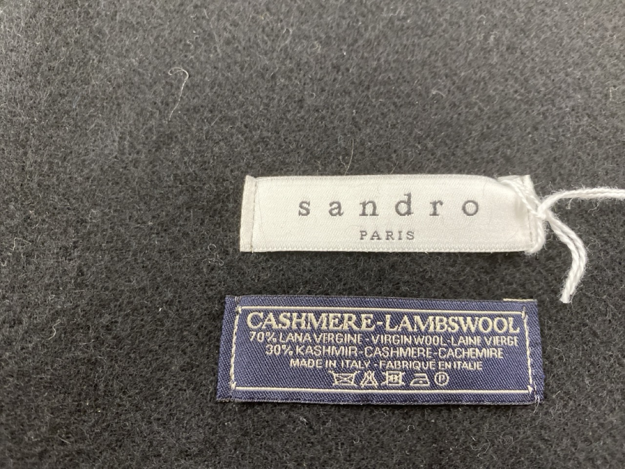 Lot 122  
            Edinburgh SR20 - Delivery Only 

                
SANDRO PARIS FRINGED SCARF IN BLACK WOOL: LOCATION - RAIL 2