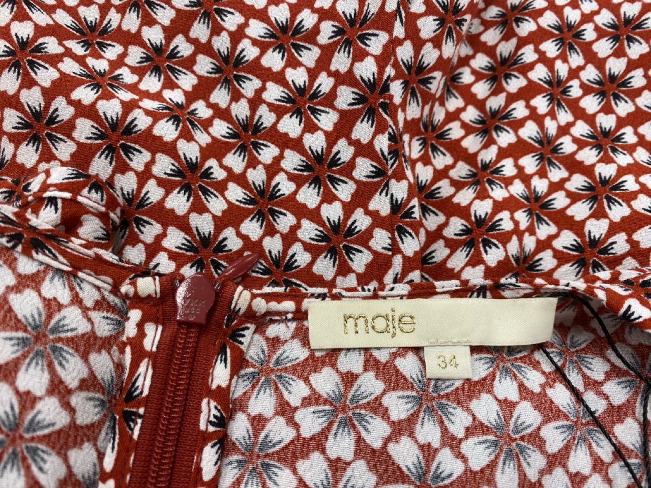 Lot 124  
            Edinburgh SR20 - Delivery Only 

                
MAJE PRINTED ROMPERS IN RED POLYESTER SIZE 34: LOCATION - RAIL 2