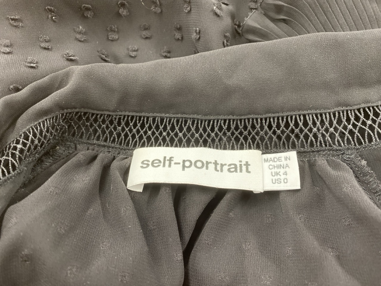 Lot 146  
            Edinburgh SR20 - Delivery Only 

                
SELF-PORTRAIT V-NECK LONG SLEEVE BLOUSE IN BLACK POLYESTER SIZE UK 4: LOCATION - ...