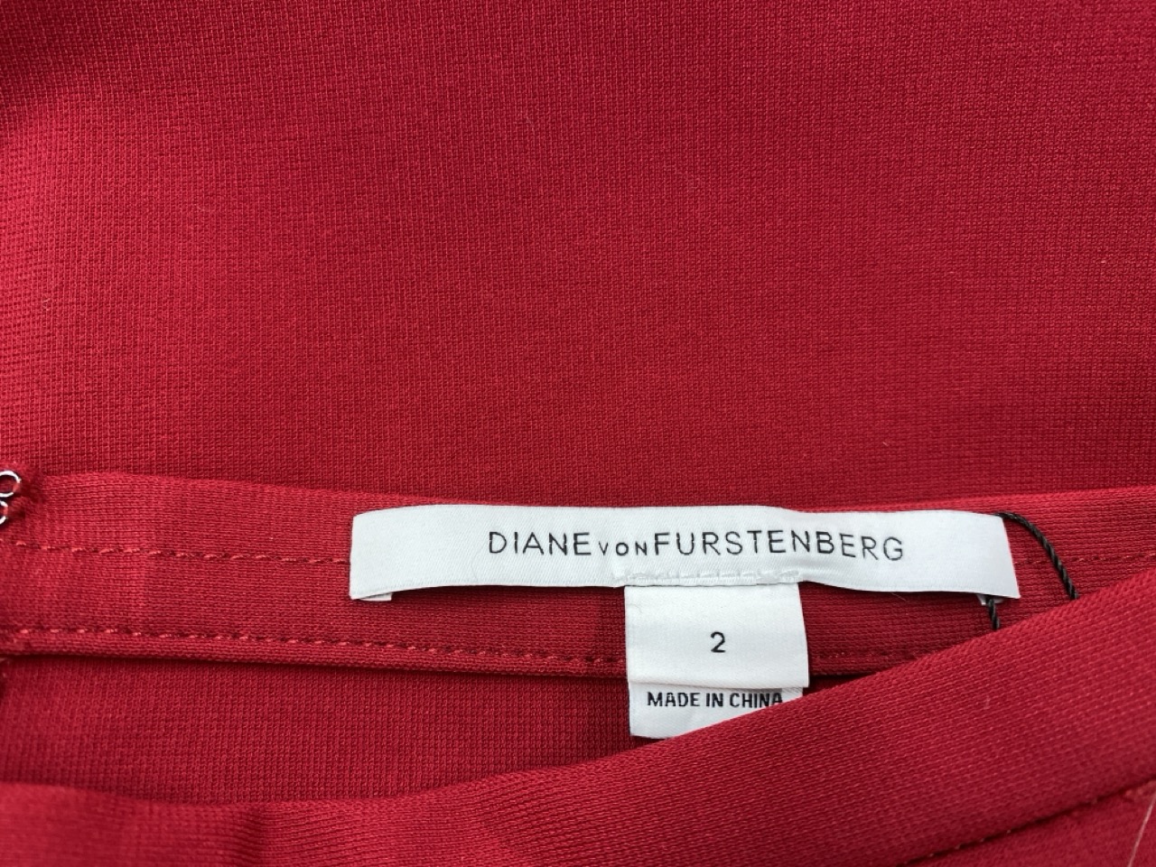 Lot 157  
            Edinburgh SR20 - Delivery Only 

                
DIANE VON FURSTENBERG PENCIL SKIRT IN RED VISCOSE SIZE 2: LOCATION - RAIL 2