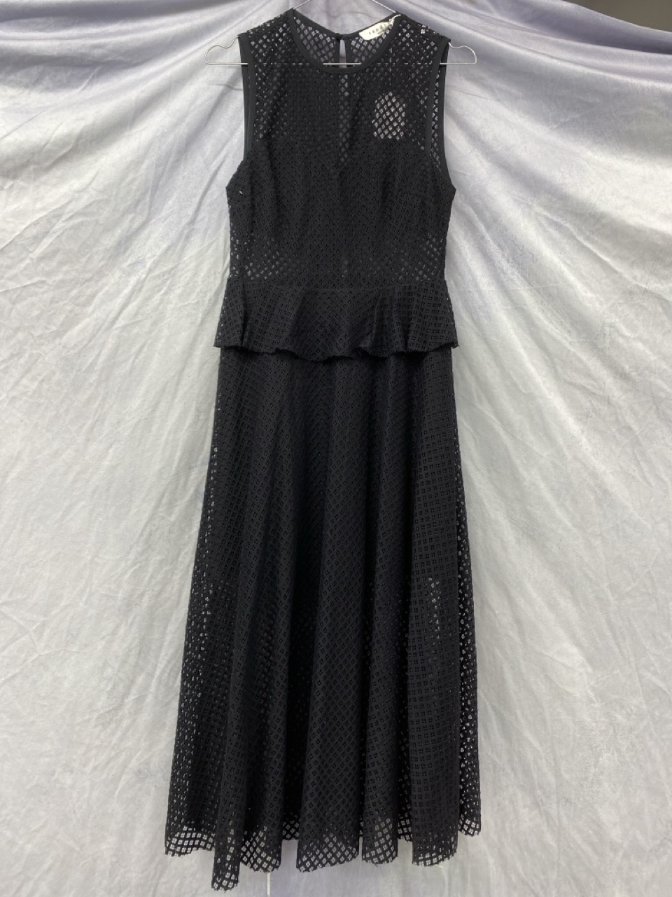 Lot 163  
            Edinburgh SR20 - Delivery Only 

                
SANDRO MESH CUTOUT SLEEVELESS MIDI DRESS IN BLACK COTTON NO SIZE : LOCATION - RAIL 2