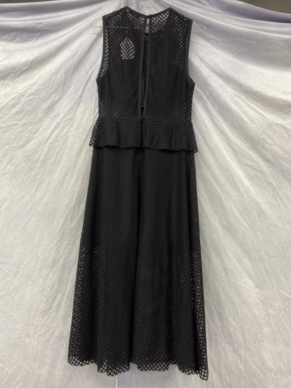 Lot 163  
            Edinburgh SR20 - Delivery Only 

                
SANDRO MESH CUTOUT SLEEVELESS MIDI DRESS IN BLACK COTTON NO SIZE : LOCATION - RAIL 2
