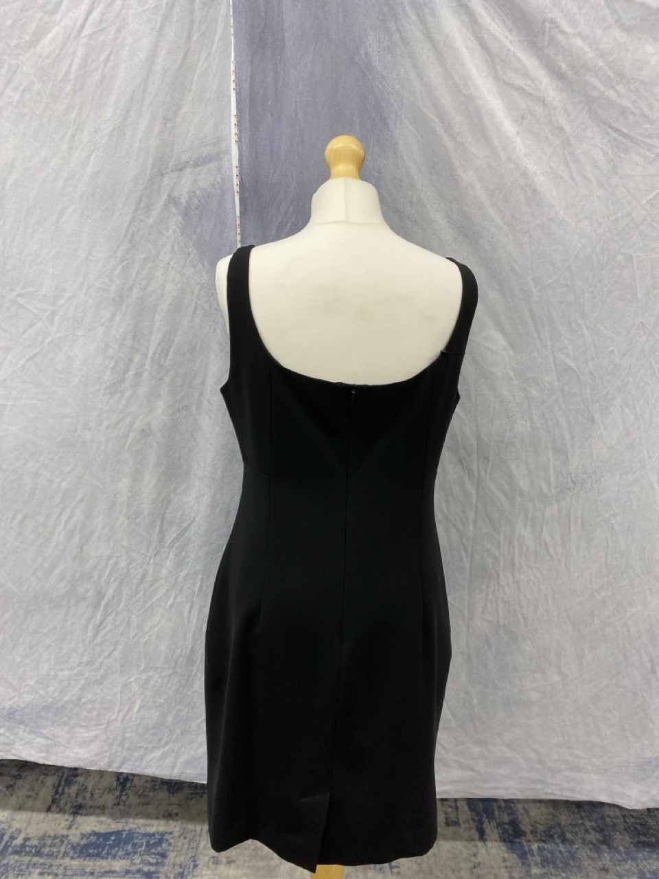 Lot 164  
            Edinburgh SR20 - Delivery Only 

                
MOSCHINO SQUARE NECK MINI DRESS IN BLACK POLYESTER SIZE UK 14: LOCATION - RAIL 2