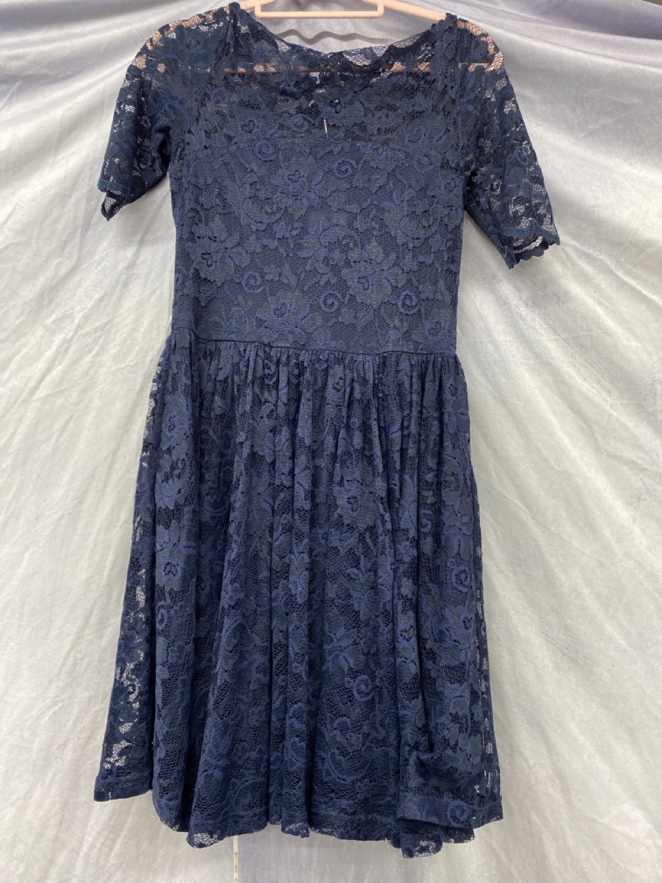 Lot 169  
            Edinburgh SR20 - Delivery Only 

                
GANNI SHORT SLEEVED MINI DRESS IN NAVY BLUE POLYAMIDE LACE NO SIZE: LOCATION - RA...