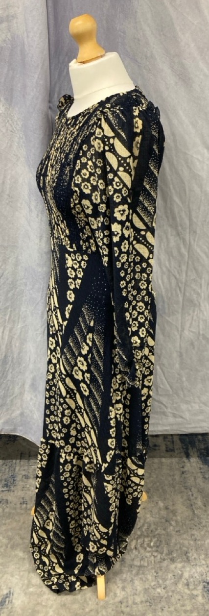 Lot 16  
            Edinburgh SR20 - Delivery Only 

                
BA&SH PRINTED LONG SLEEVE MAXI DRESS IN NAVY BLUE POLYESTER SIZE 2: LOCATION - RA...