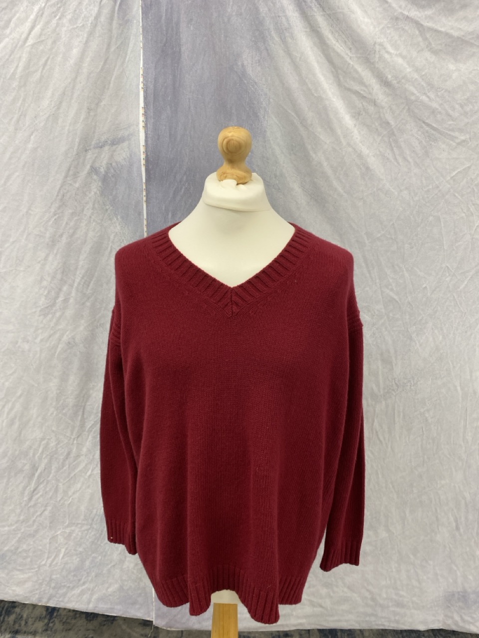 Lot 175  
            Edinburgh SR20 - Delivery Only 

                
PRADA ELBOW PATCH V-NECK SWEATER IN BURGUNDY WOOL SIZE 40: LOCATION - RAIL 2