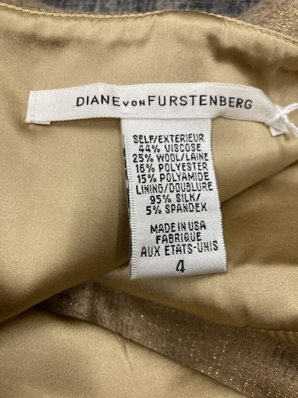 Lot 190  
            Edinburgh SR20 - Delivery Only 

                
DIANE VON FURSTENBERG GOLD LAME SHEATH DRESS IN VISCOSE SIZE 4: LOCATION - RAIL 2