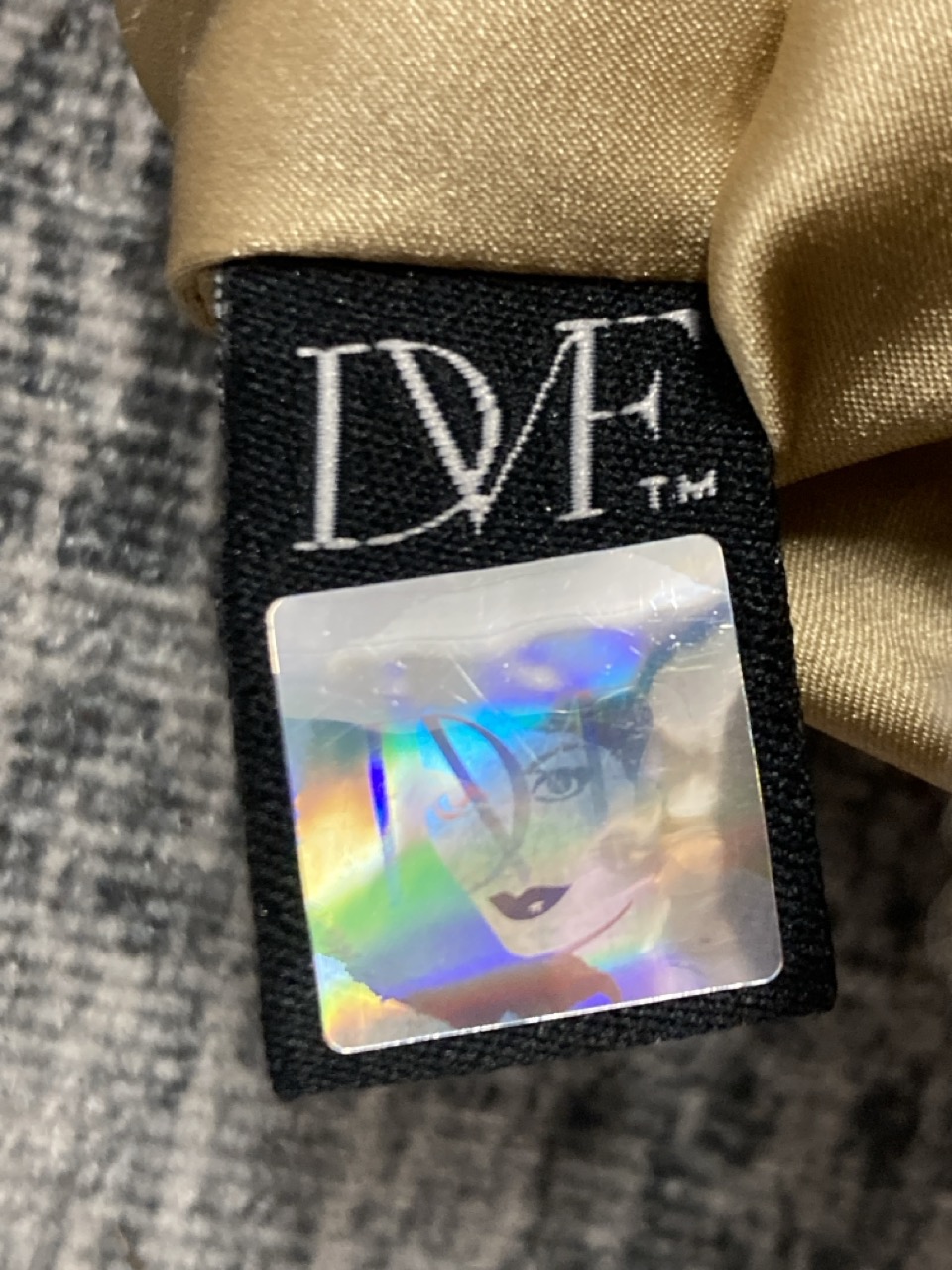 Lot 190  
            Edinburgh SR20 - Delivery Only 

                
DIANE VON FURSTENBERG GOLD LAME SHEATH DRESS IN VISCOSE SIZE 4: LOCATION - RAIL 2