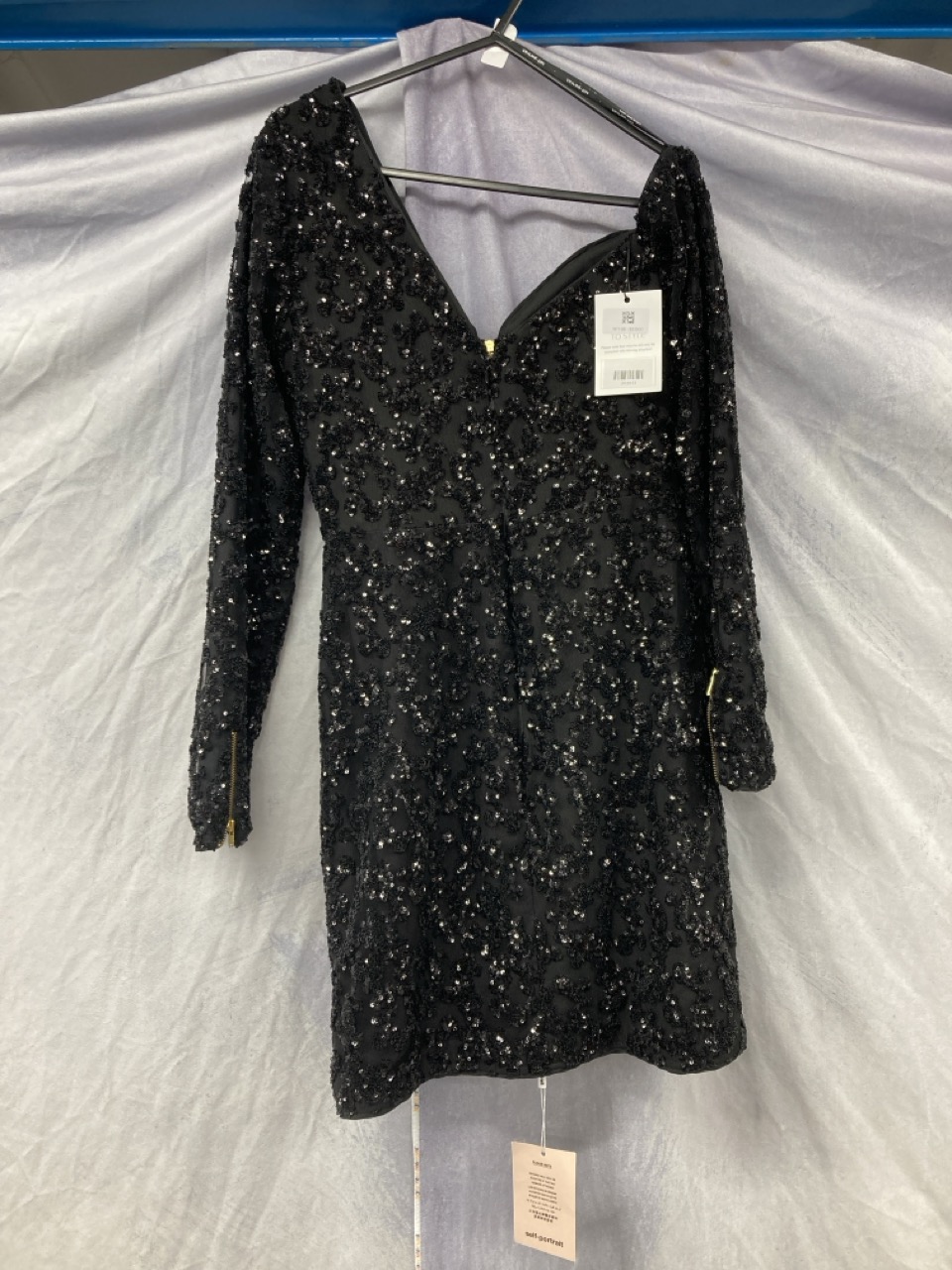 Lot 204  
            Edinburgh SR20 - Delivery Only 

                
SELF-PORTRAIT SEQUIN-EMBELLISHED OFF-THE-SHOULDER MINI DRESS IN BLACK POLYESTER N...