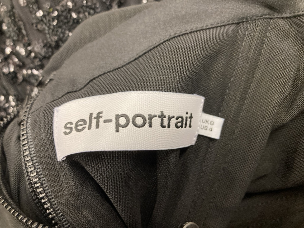 Lot 204  
            Edinburgh SR20 - Delivery Only 

                
SELF-PORTRAIT SEQUIN-EMBELLISHED OFF-THE-SHOULDER MINI DRESS IN BLACK POLYESTER N...