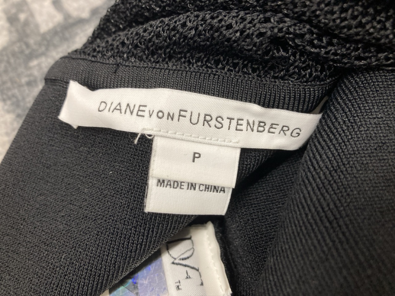 Lot 205  
            Edinburgh SR20 - Delivery Only 

                
DIANE VON FURSTENBERG MOSCOW MESH INSERT KNIT DRESS IN BLACK RAYON SIZE P: LOCATI...