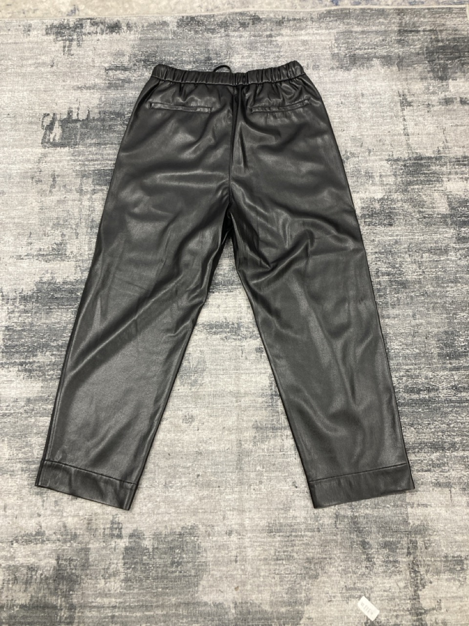 Lot 207  
            Edinburgh SR20 - Delivery Only 

                
NANUSKHA DRAWSTRING PANTS IN BLACK FAUX LEATHER SIZE M: LOCATION - RAIL 2