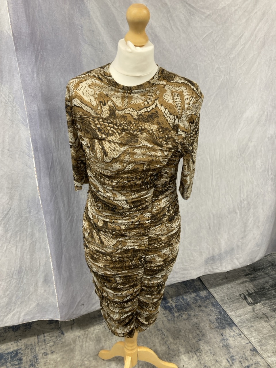 Lot 21  
            Edinburgh SR20 - Delivery Only 

                
GANNI RUCHED MINI DRESS IN BROWN PRINT POLYAMIDE NO SIZE: LOCATION - RAIL 3
