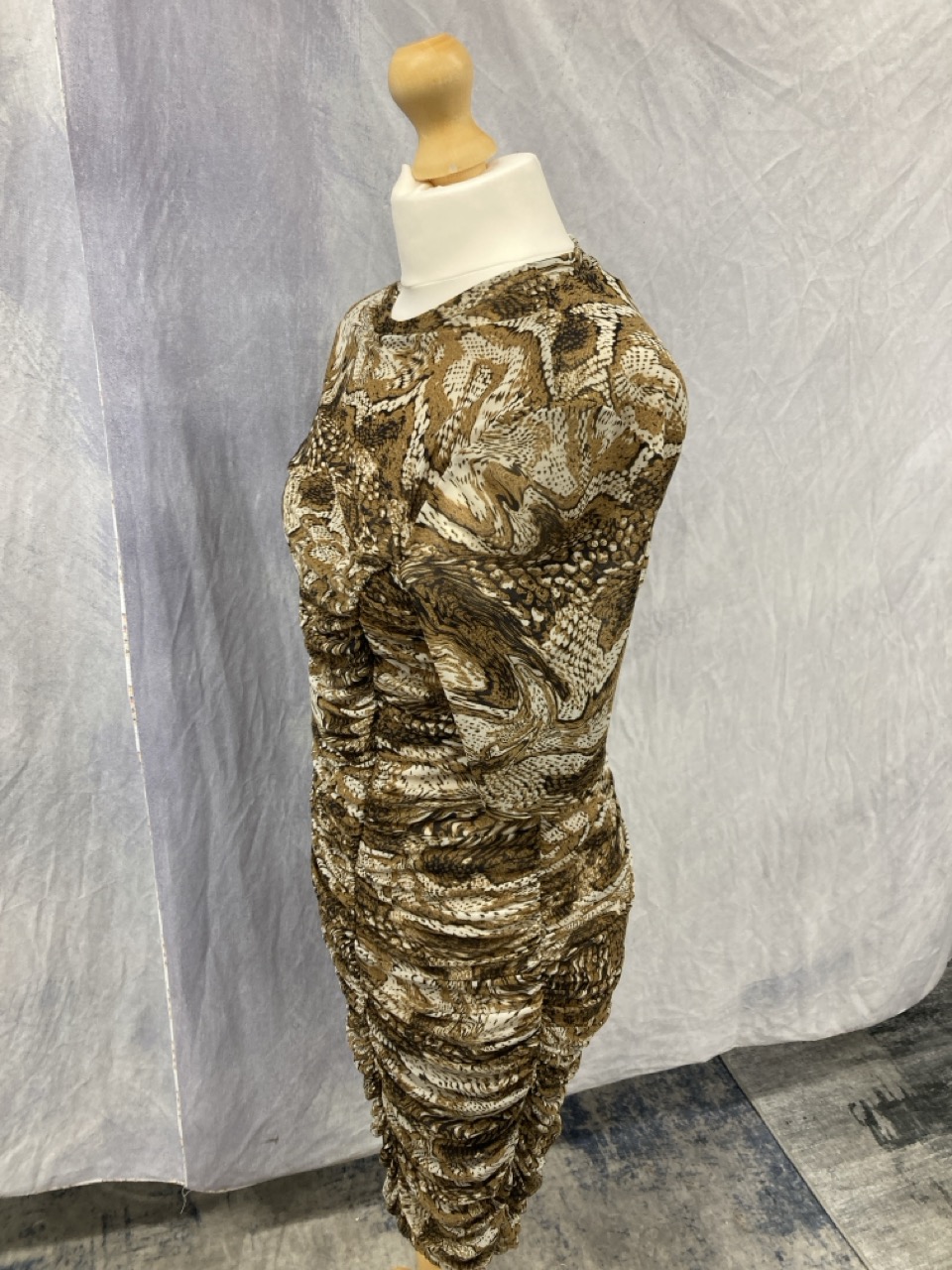 Lot 21  
            Edinburgh SR20 - Delivery Only 

                
GANNI RUCHED MINI DRESS IN BROWN PRINT POLYAMIDE NO SIZE: LOCATION - RAIL 3