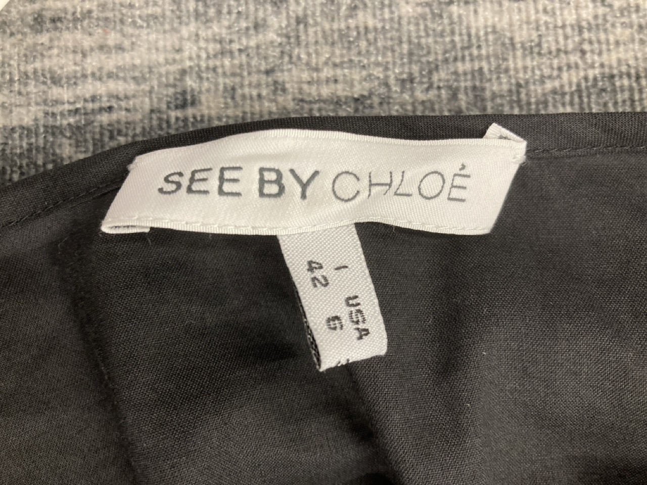 Lot 223  
            Edinburgh SR20 - Delivery Only 

                
SEE BY CHLOE SLEEVELESS TIERED MINI DRESS IN BLACK SILK SIZE 42: LOCATION - RAIL 2