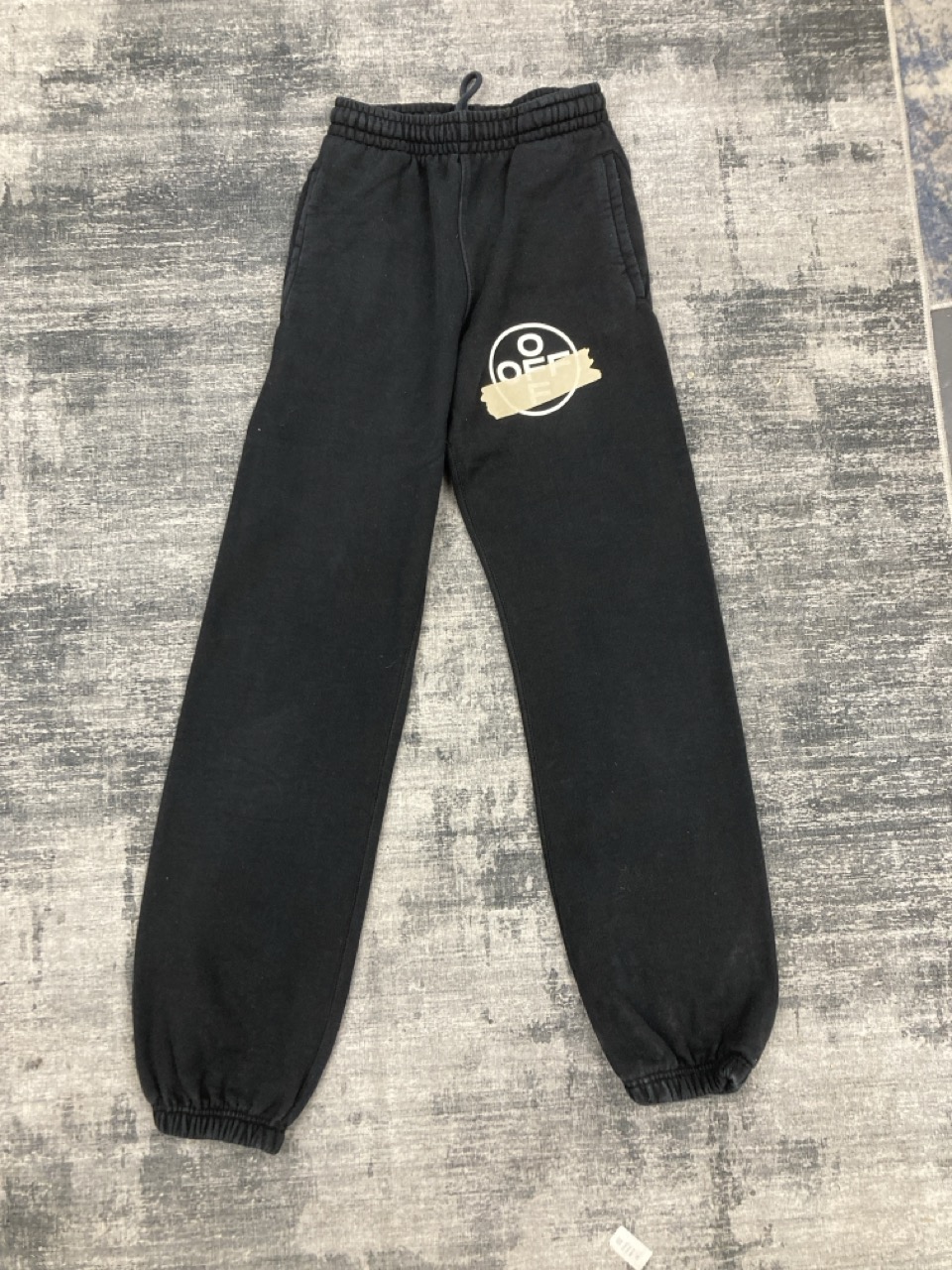 Lot 229  
            Edinburgh SR20 - Delivery Only 

                
OFF-WHITE SWEATPANTS IN BLACK COTTON SIZE XXS: LOCATION - RAIL 2
