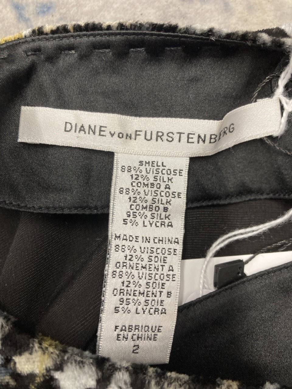 Lot 22  
            Edinburgh SR20 - Delivery Only 

                
DIANE VON FURSTENBERG PRINTED MINI DRESS IN BLACK VELVET SIZE 2: LOCATION - RAIL 3