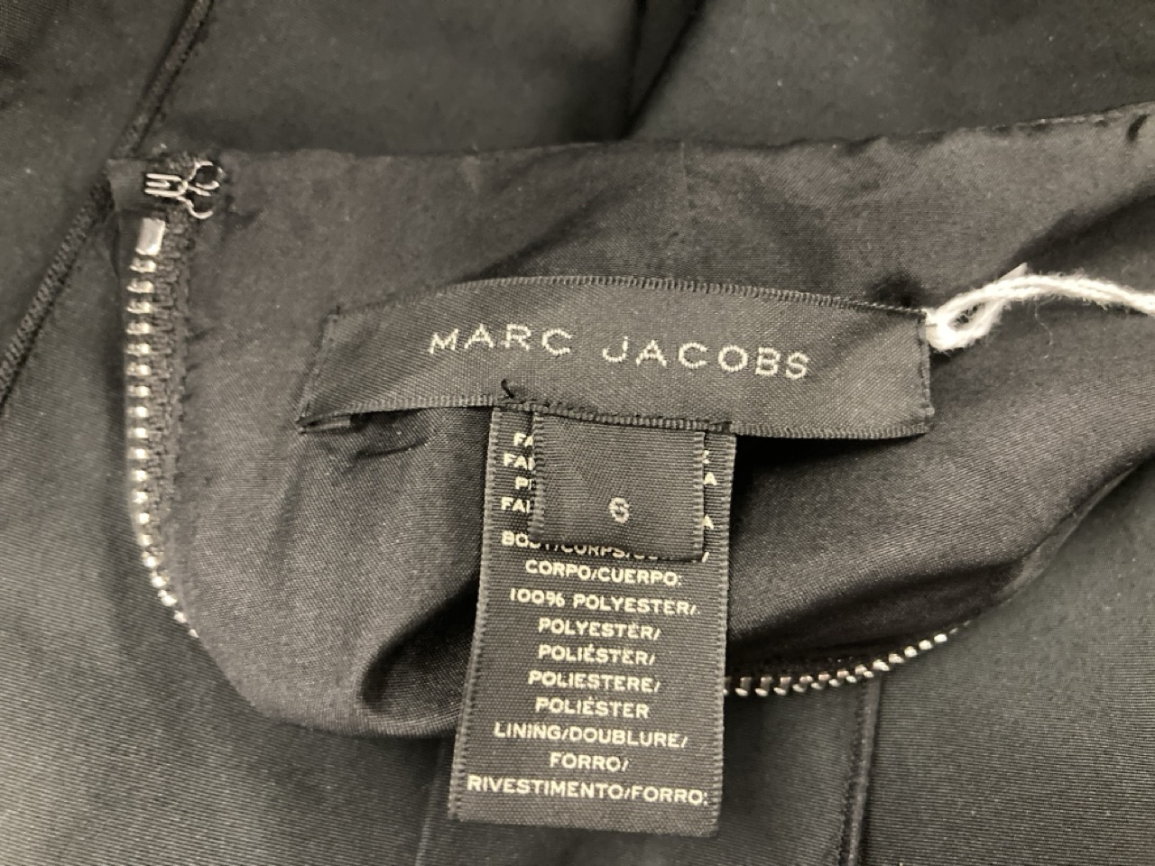 Lot 231  
            Edinburgh SR20 - Delivery Only 

                
MARC JACOBS PLEATED SLEEVELESS DRESS IN BLACK POLYESTER SIZE 6: LOCATION - RAIL 2