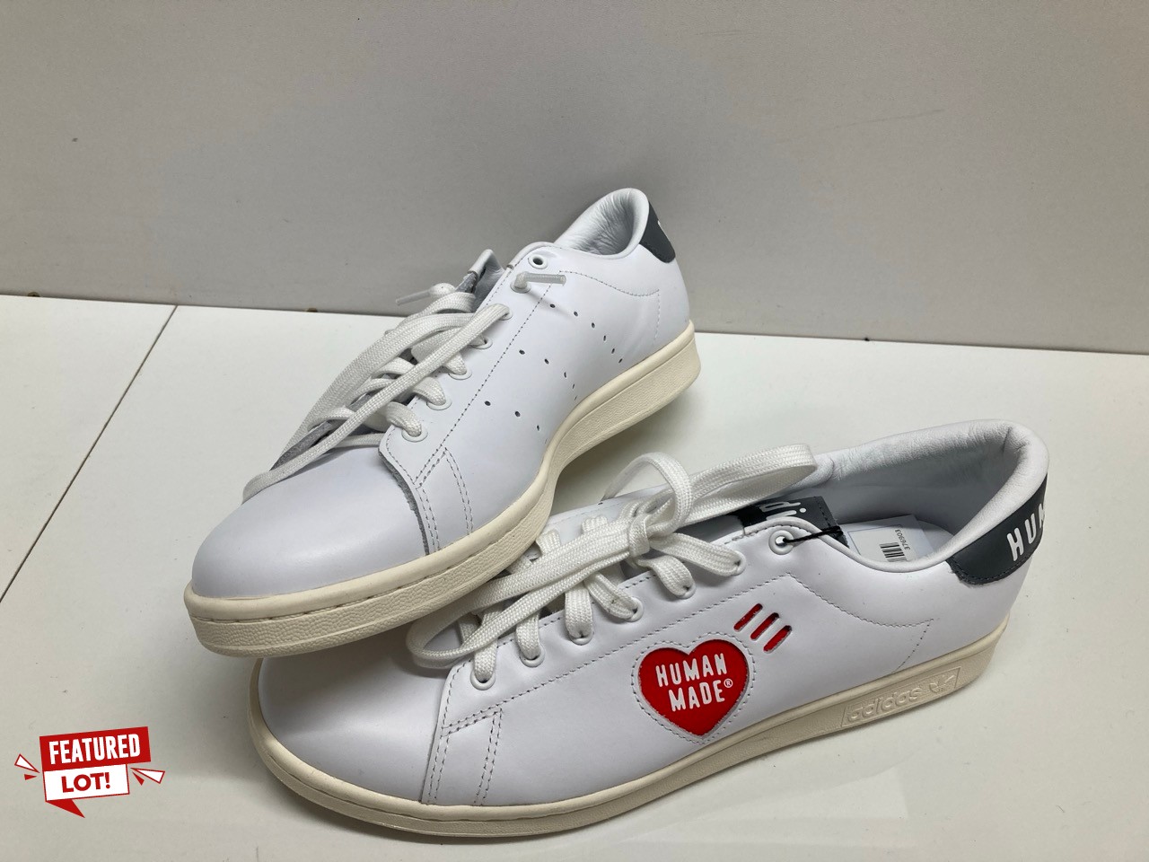 Lot 240  
            Edinburgh SR20 - Delivery Only 

                
ADIDAS  X HUMAN MADE STAN SMITH LOW TOP SNEAKERS IN WHITE LEATHER NO SIZE: LOCATI...