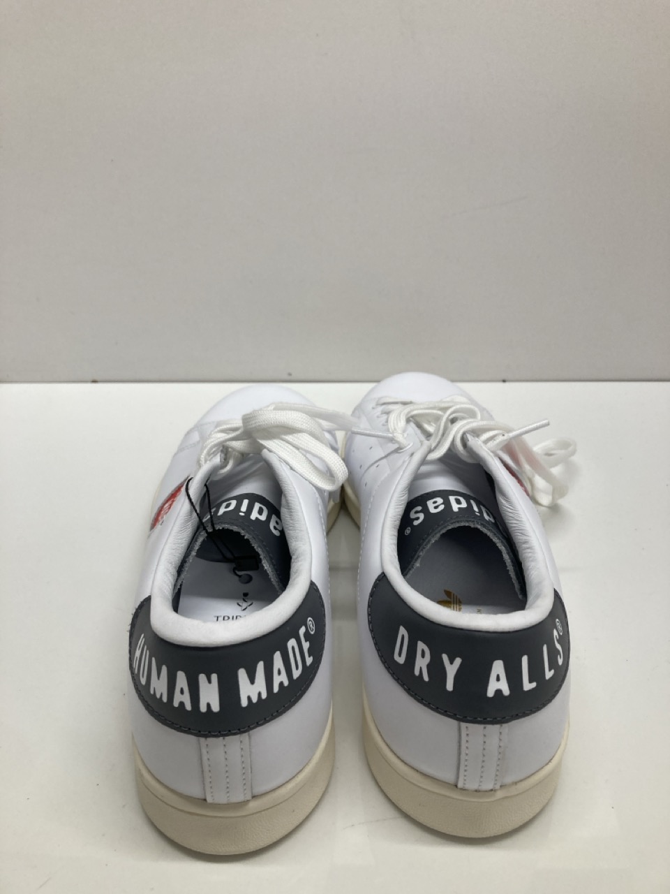 Lot 240  
            Edinburgh SR20 - Delivery Only 

                
ADIDAS  X HUMAN MADE STAN SMITH LOW TOP SNEAKERS IN WHITE LEATHER NO SIZE: LOCATI...
