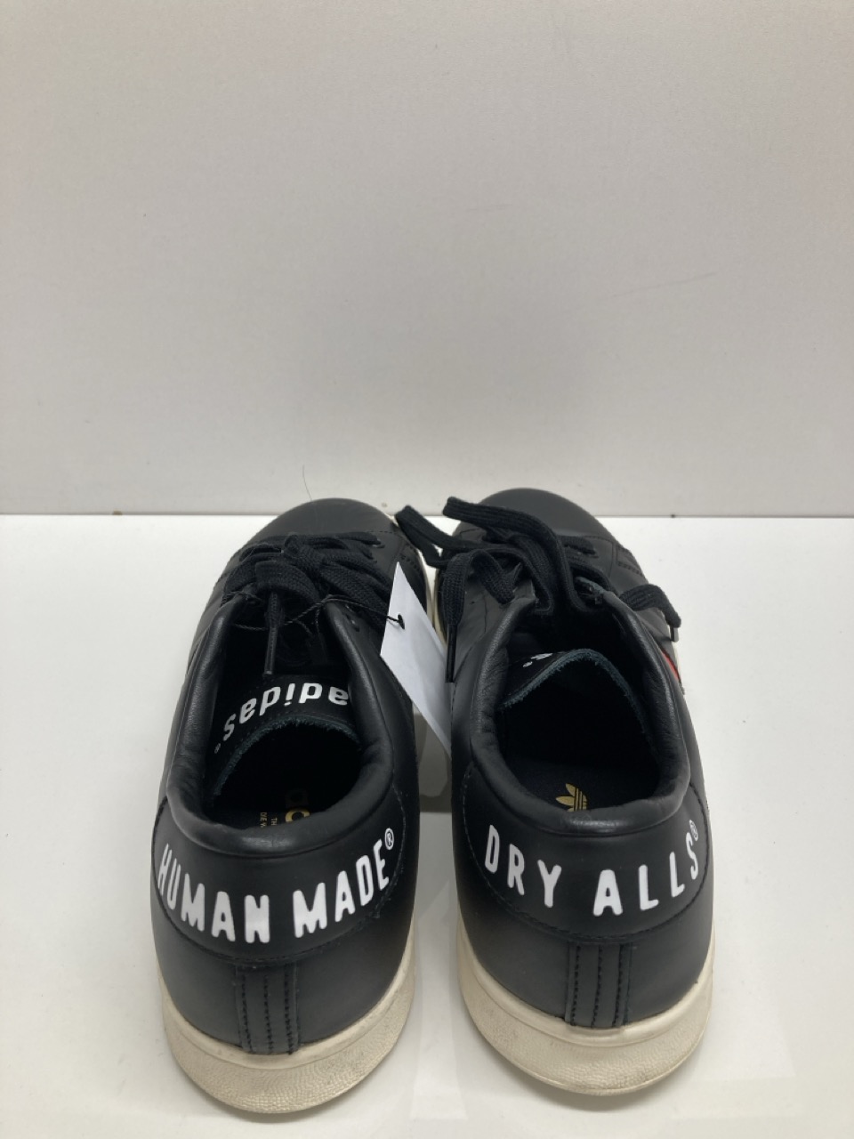 Lot 243  
            Edinburgh SR20 - Delivery Only 

                
ADIDAS  X HUMAN MADE STAN SMITH LOW TOP SNEAKERS IN BLACK LEATHER NO SIZE: LOCATI...