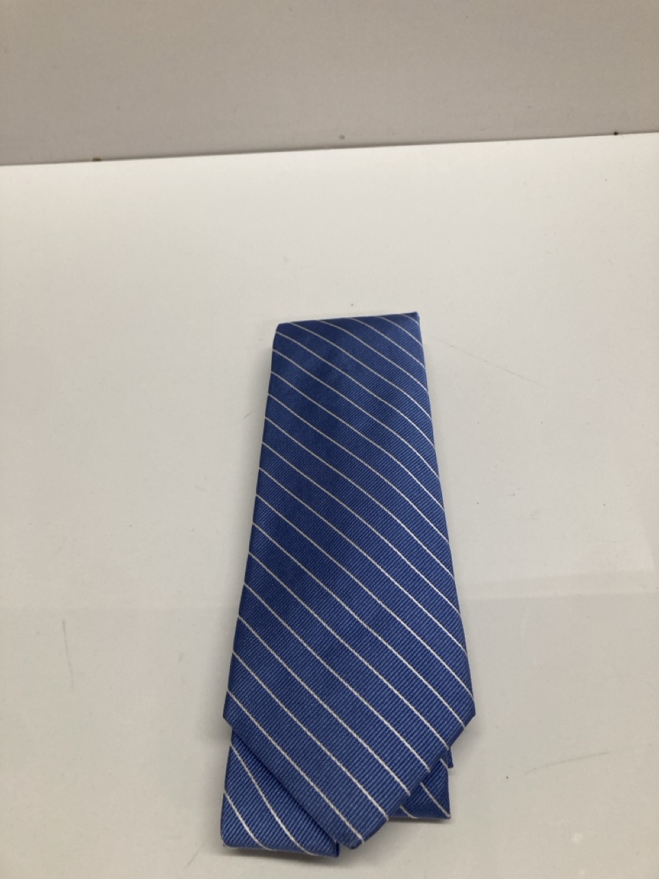 Lot 245  
            Edinburgh SR20 - Delivery Only 

                
RALPH LAUREN STRIPE FORMAL TIE IN BLUE PRINT SILK: LOCATION - TABLE 1
