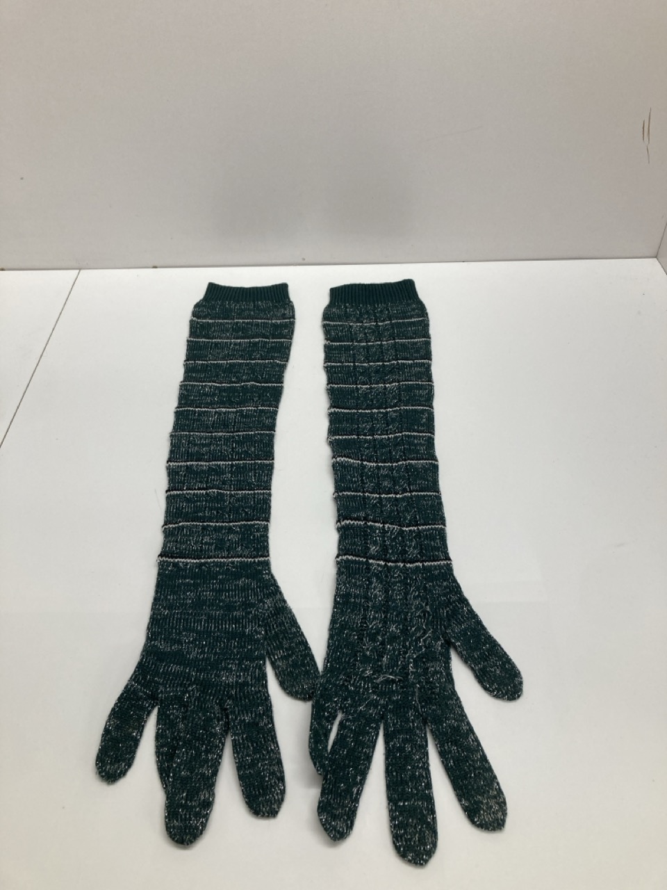Lot 254  
            Edinburgh SR20 - Delivery Only 

                
PRADA STRIPED LONG KNITTED GLOVES IN GREEN WOOL BLEND : LOCATION - TABLE 1