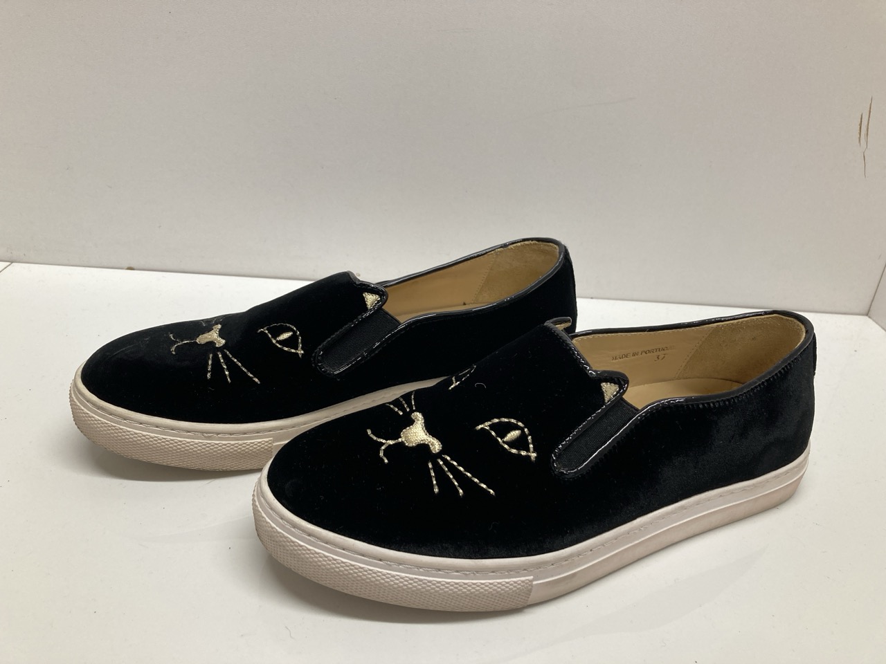 Lot 271  
            Edinburgh SR20 - Delivery Only 

                
CHARLOTTE OLYMPIA EMBROIDERED ACCENT SNEAKERS IN BLACK VELVET SIZE UK 4: LOCATION...