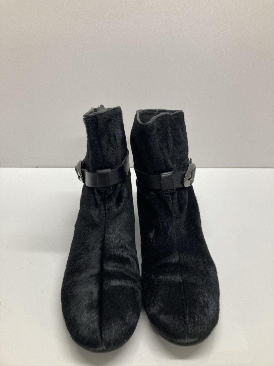 Lot 275  
            Edinburgh SR20 - Delivery Only 

                
GIUSEPPE ZANOTTI BUCKLED ANKLE BOOTS IN BLACK PONY-STYLE LEATHER SIZE 35.5: LOCAT...