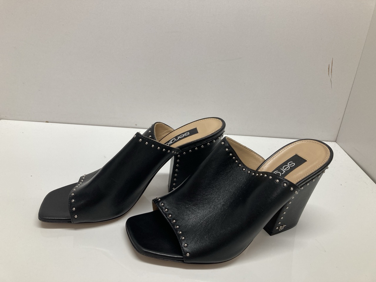 Lot 292  
            Edinburgh SR20 - Delivery Only 

                
SERGIO ROSSI STUDDED CHUNKY HEELS IN BLACK LEATHER SIZE UK 4: LOCATION - TABLE 2